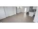 An open-concept living space into the kitchen and dining at 4851 W Gandy Blvd # B1L14, Tampa, FL 33611