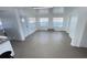 Spacious living room features sleek floors and natural light at 4851 W Gandy Blvd # B1L14, Tampa, FL 33611