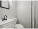 Bathroom features a modern vanity and tile flooring at 5346 Riddle Rd, Holiday, FL 34690