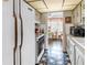 View of functional kitchen and dining area showcasing essential appliances and layout at 5347 81St N Ln # 25, St Petersburg, FL 33709