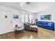 Bright living room with modern furnishings and a comfortable sitting area at 5347 81St N Ln # 25, St Petersburg, FL 33709