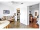 Cozy living room area with view into adjacent kitchen and bedroom providing a relaxing space for the residents at 5347 81St N Ln # 25, St Petersburg, FL 33709
