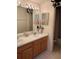 Bathroom features double sinks, vanity, and mirror at 540 Somerhill Ne Dr, St Petersburg, FL 33716