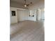 Open-concept living room featuring tile flooring and neutral walls at 540 Somerhill Ne Dr, St Petersburg, FL 33716