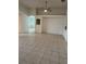 Open concept living room featuring tile floors and high ceilings at 540 Somerhill Ne Dr, St Petersburg, FL 33716