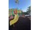 Community playground with slide and play equipment at 540 Somerhill Ne Dr, St Petersburg, FL 33716