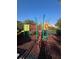 Colorful playground area for with slide, ladder, and other equipment at 540 Somerhill Ne Dr, St Petersburg, FL 33716