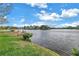 Scenic view of the tranquil lake, showcasing the property's serene and picturesque waterfront location at 540 Somerhill Ne Dr, St Petersburg, FL 33716