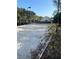 Sand volleyball court with net and landscaping at 540 Somerhill Ne Dr, St Petersburg, FL 33716