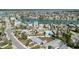Aerial perspective of waterfront residences with canals and ocean access in a coastal setting at 596 S Bayshore Dr, Madeira Beach, FL 33708