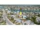 Aerial view highlighting the home's location, private pool, and proximity to the waterfront community at 596 S Bayshore Dr, Madeira Beach, FL 33708