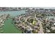 Aerial view of the home located on a waterfront neighborhood at 596 S Bayshore Dr, Madeira Beach, FL 33708