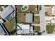 An aerial view of a home featuring an expansive fenced in yard at 596 S Bayshore Dr, Madeira Beach, FL 33708