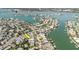 A beautiful aerial view of a waterfront neighborhood with winding canals at 596 S Bayshore Dr, Madeira Beach, FL 33708