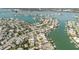 High angle view of waterfront homes and canals, highlighting the community's access to the water at 596 S Bayshore Dr, Madeira Beach, FL 33708