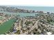 Aerial picture features waterfront property that highlights canal access and beautiful scenery at 596 S Bayshore Dr, Madeira Beach, FL 33708