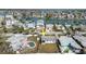 Aerial view of property featuring a pool and proximity to waterfront at 596 S Bayshore Dr, Madeira Beach, FL 33708
