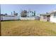 A home with a large fenced backyard at 596 S Bayshore Dr, Madeira Beach, FL 33708