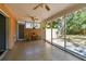 This screened porch offers views of a verdant backyard at 5998 Grove S St, St Petersburg, FL 33705