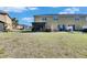 A expansive backyard with a screened-in porch, offering ample space for relaxation and outdoor activities at 6907 Holly Heath Dr, Riverview, FL 33578
