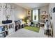 Cozy bedroom with a playful design, perfect for children or a creative space at 6907 Holly Heath Dr, Riverview, FL 33578