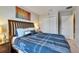 This bedroom has soft carpet and is well lit by natural light from a large window at 6907 Holly Heath Dr, Riverview, FL 33578
