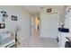 Bedroom featuring neutral walls, sliding closet doors, and carpeted flooring, offering a serene retreat at 6907 Holly Heath Dr, Riverview, FL 33578