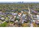 Aerial view of a charming neighborhood with lush greenery and the downtown skyline in the distance at 777 29Th N Ave, St Petersburg, FL 33704