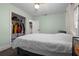 Bedroom with closet space, ample storage, and natural light from the window at 803 S Evergreen Ave, Clearwater, FL 33756