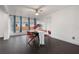 Bright dining room with modern table and chairs under ceiling fan and natural light at 803 S Evergreen Ave, Clearwater, FL 33756