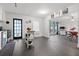 Open kitchen and dining area featuring modern appliances and a casual dining space at 803 S Evergreen Ave, Clearwater, FL 33756