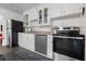 Updated kitchen featuring stainless steel appliances and white subway tile backsplash at 803 S Evergreen Ave, Clearwater, FL 33756