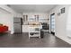 Bright kitchen with stainless steel appliances and white cabinetry at 803 S Evergreen Ave, Clearwater, FL 33756