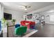 Open living space with colorful decor, modern lighting, and stylish furnishings at 803 S Evergreen Ave, Clearwater, FL 33756