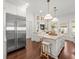 Spacious kitchen features an island, stainless steel appliances, and an eat-in area at 803 S Packwood Ave, Tampa, FL 33606