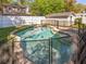 A private pool with a safety fence offers a serene backyard retreat at 803 S Packwood Ave, Tampa, FL 33606