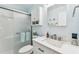Bathroom features a vanity with a white countertop, updated faucet, and a cabinet for storage at 8220 112Th N St # 206, Seminole, FL 33772