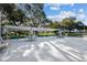 Spacious outdoor common area featuring ample seating and tables under a shaded structure for community enjoyment at 8220 112Th N St # 206, Seminole, FL 33772