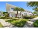 Beautiful two-story building with manicured landscaping and private balconies at 8220 112Th N St # 206, Seminole, FL 33772
