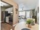 Open concept kitchen flowing into a living area with a relaxing seating arrangement at 8220 112Th N St # 206, Seminole, FL 33772