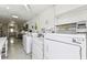 Bright laundry room featuring well-maintained washers and dryers for the convenience of residents at 8220 112Th N St # 206, Seminole, FL 33772