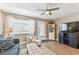 Relaxing living room with comfortable seating, neutral tones, and ample natural light at 8220 112Th N St # 206, Seminole, FL 33772