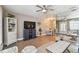 Inviting living room featuring a TV, stylish furniture, and light wood flooring at 8220 112Th N St # 206, Seminole, FL 33772