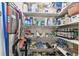 Walk-in pantry with ample shelving for storage, complete with space for cleaning supplies, food and more at 8220 112Th N St # 206, Seminole, FL 33772