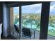 Relax on the balcony with beautiful views of the beach and coastline at 880 Mandalay Ave # N802, Clearwater Beach, FL 33767