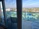 A view from a furnished balcony overlooking the water and beach area at 880 Mandalay Ave # N802, Clearwater Beach, FL 33767