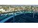 Enjoy breathtaking views from your private balcony, complete with seating and glass railings at 880 Mandalay Ave # N802, Clearwater Beach, FL 33767