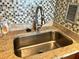 Close-up of kitchen sink and faucet at 880 Mandalay Ave # N802, Clearwater Beach, FL 33767