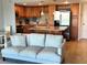 Open kitchen with stainless steel appliances, a center island, and hanging lights at 880 Mandalay Ave # N802, Clearwater Beach, FL 33767