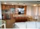 Bright kitchen boasts stainless appliances, granite counters, and a convenient island at 880 Mandalay Ave # N802, Clearwater Beach, FL 33767